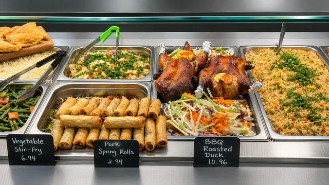 Spring rolls and appetizers in the hot case